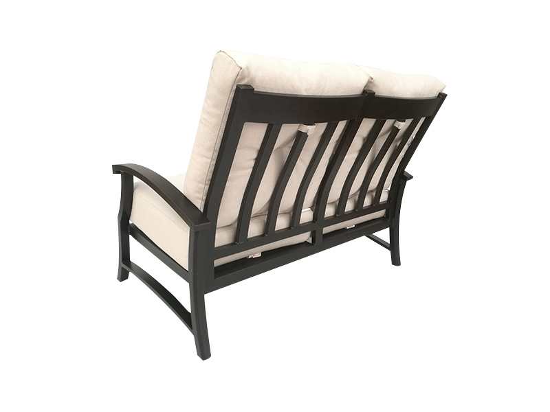 Loveseat Solstice de aluminio bronce envejecido con cojines para patio