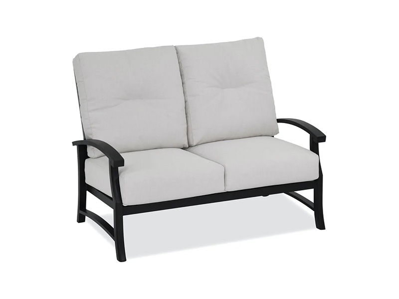 Loveseat Solstice de aluminio bronce envejecido con cojines para patio